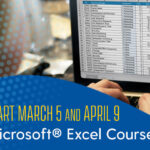 fingers type on computer keyboard as scree shows an Excel spreadsheet